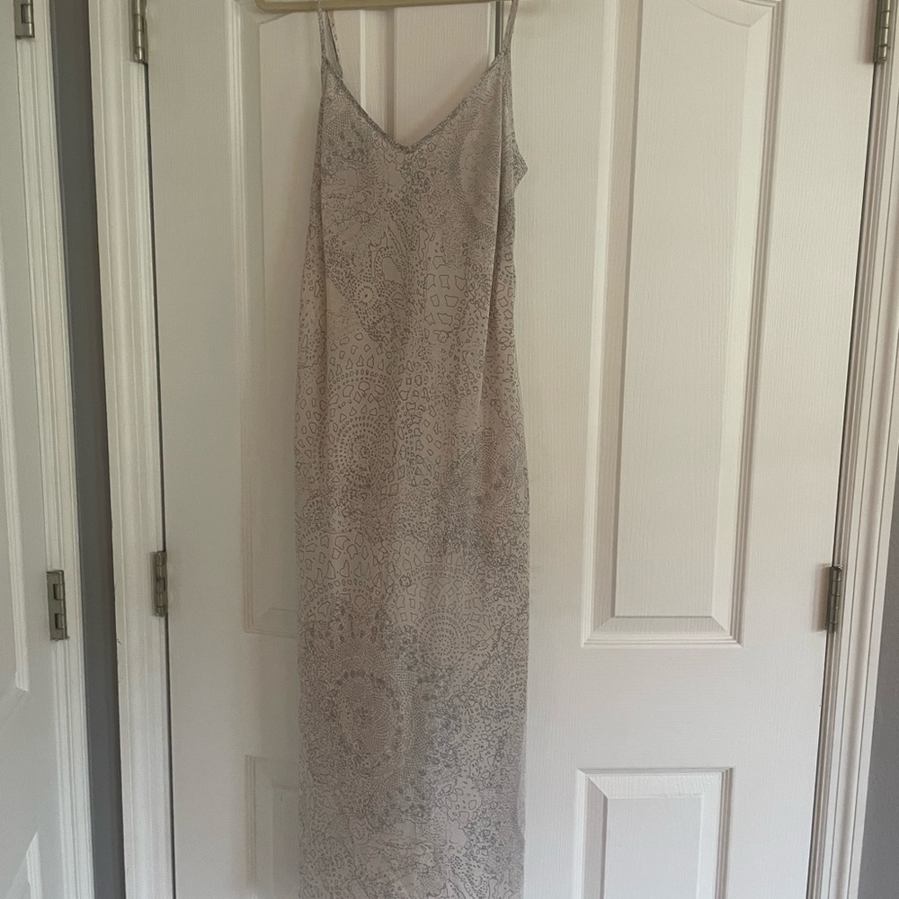 Silk slip/ Versatile worn by itself /Layered it’s gorgeous. Tags on never worn